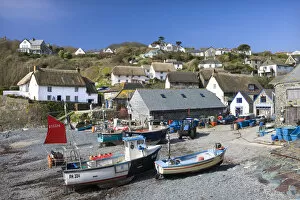 Images Dated 8th April 2022: Fishing boats and thatched cottages in the Cornish fishing village of Cadgwith, Lizard, Cornwall
