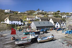 Fishing Boats Gallery: Fishing boats and thatched cottages in the Cornish fishing village of Cadgwith, Lizard, Cornwall
