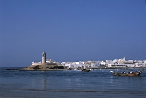 Sea Scape Prints: A fishing dhow motors across the lagoon towards