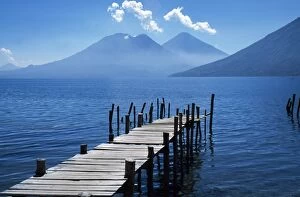 Lake Atitlan Gallery: Fishing jetty on Lake Atitlan with volcanoes Toliman and Atitlan behind
