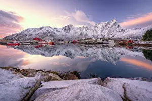 Lifestyles Prints: Fishing village of Ballstad and snowy mountains reflected in the sea at dawn