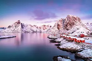 Lofoten Prints: Fishing village of Hamnoy and snowy mountains under a colorful sky at sunrise
