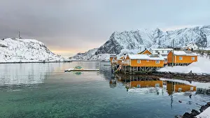 Sakrisoy Prints: Fishing village of Sakrisoy and snowcapped mountains reflected in the cold turquoise sea