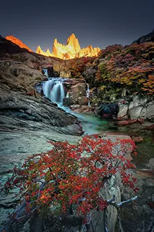 Patagonia Prints: Fitzroy mountain and the Hidden waterfall at sunrise in the Los Glacieres National Park near El Chalten