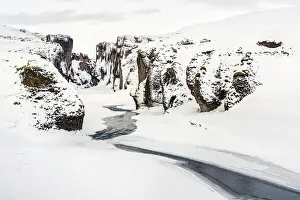 Icelandic Gallery: The Fjadrargljufur Canyon covered by ice and snow, Iceland