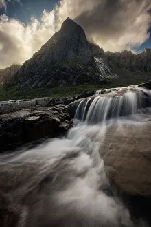 Images Dated 24th January 2023: Flakstad fjord with a small stream coming down to the sea. Lofoten Islands, Norway