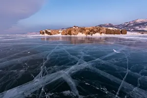 Desolation Prints: A flat ice with cracks of the lake Baikal, Cape Uyuga, Irkutsk region, Siberia, Russia