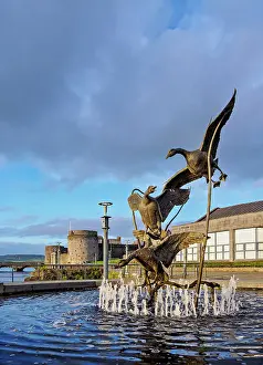 King John Prints: Flight of the Wild Geese Fountain of Heritage with King John's Castle in the background at sunset