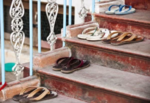 Images Dated 20th May 2013: Flips flops outside monksaA┬ÇA┬Ö dormitory, Mahagandayon Monastery, largest Buddhist monastery