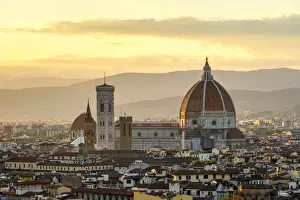 Florence Cathedral (Duomo di Firenze) and buildings in the old town at sunset, Florence