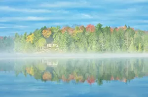 Seasons Gallery: Fog on Horseshoe Lake in autumn with cottage, Near Parry Sound, Ontario, Canada
