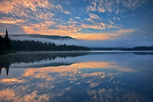 Sunrise Sunset Prints: Fog and reflection on Lac La Joie at sunrise