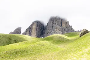 Val Gardena Prints: Fog over rocky peaks and green rolling landscape on trail around the Sassolungo group