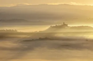 Foggy morning at Castiglione Falletto during autumn at sunrise, Cuneo, Langhe e Roero Foggy morning at Castiglione Falletto during autumn at sunrise, Cuneo, Langhe e Roero