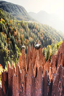 Red Rocks Prints: Foggy sky in autumn over the earth pyramids natural monument, Longomoso, Renon / Ritten