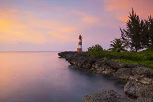 Folly Point Lighthouse Illuminated at Sunset, Port Antonio, Portland Parish, Jamaica