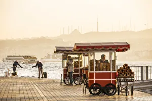 Food vendor selling simit, Golden Horn, Istanbul, Turkey