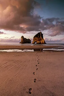 Footprints Prints: Footprints leading to Archway Islands, Wharariki Beach, South Island, New Zealand