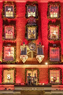Clock Prints: Fortnum and Mason illuminated at Christmas, Piccadilly, London, England, UK