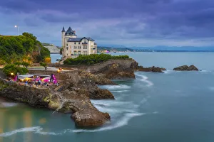 Motion Prints: France, Aquitaine, Pyrenees Atlantiques, Biarritz. Old mansion on the cliffs at dusk