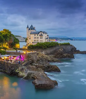 Motion Prints: France, Aquitaine, Pyrenees Atlantiques, Biarritz. Old mansion on the cliffs at dusk