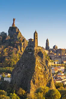 France, Auvergne-Rhone-Alpes, Haute-Loire, Le Puy-en-Velay. Cityscape at sunset