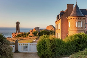 Cotes Darmor Prints: France, Brittany, Cotes d'Armor, Ploumanach lighthouse, Ploumanach village
