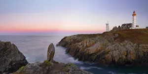 France, Brittany, Finistere, Pointe St. Mathieu, Saint Mathieu lighthouse and menhir