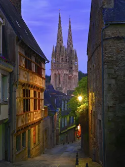 France, Brittany, Finistere, Quimper, view down cobbled street to Saint Corentin