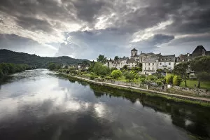Images Dated 27th June 2017: France, Correze, Argentat, The old town and riverbank reflected in the Dordogne river