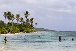 Guadeloupe Prints: France, Guadeloupe, Sainte-Anne, People bathing at Bois Jolan beach