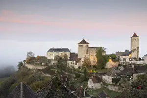 Occitanie Prints: France, Midi-Pyrenees, Lot, Montvalent village illuminated before sunrise