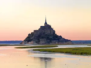 France, Normandy, Le Mont Saint Michel reflected at dusk
