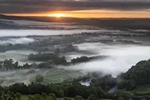South West France Prints: France, Occitanie, Lot, aerial view of the Dordogne river on a misty morning at sunrise