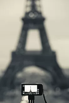 France, Paris, Eiffel Tower photographed with digital camera, dawn