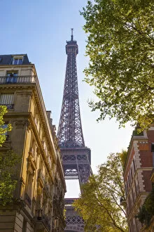 France, Paris, Eiffel Tower, view through street