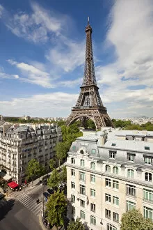 France, Paris, Eiffel Tower, viewed over rooftops