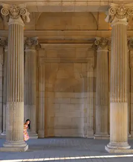 Ile De France Prints: France, Paris, The Louvre, girl aged 8 hiding behind pillar (MR)