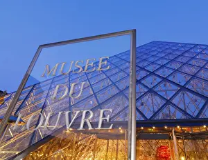 Ile De France Prints: France, Paris, The Louvre, sign and pyramid illuminated at night