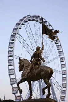 Images Dated 19th August 2010: France, Paris, Place des Pyramides, Statue of Joan of Arc and Carousel