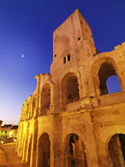 France, Provence, Arles, Roman Amphitheatre at dusk