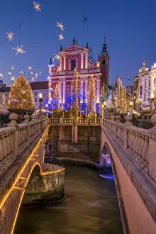 Franciscan Church of the Annunciation and Triple Bridge or Tromostovje adorned with