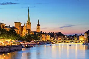 Beer Garden Prints: Fraumunster church, St Peter church on Limmat River at dusk, Zurich, Switzerland