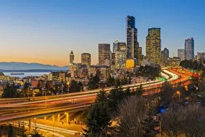 City Center Collection: Freeway traffic and downtown skyline at dusk, Seattle, Washington, USA