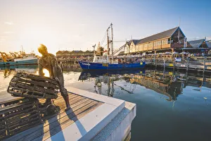 Fremantle, Perth, Western Australia, Australia. Statue at Fremantle Harbour at sunset