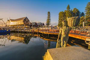 Fremantle, Perth, Western Australia, Australia. Statue at Fremantle Harbour at sunset