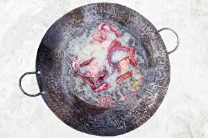 Tanzanian Gallery: a freshly caught octopus is cooked on the beach, Zanzibar, Tanzania