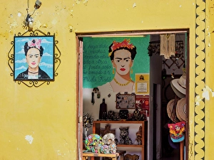 Marketplace Prints: Frida Kahlo painting at the souvenir shop, Izamal, Yucatan State, Mexico