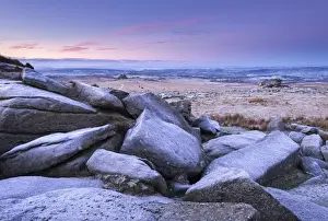Frost covered granite boulders at Great Staple Tor in Dartmoor National Park, Devon, England