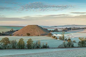 Wiltshire Prints: Frosty winter morning at Silbury Hill in Wiltshire, England. Winter (February) 2023